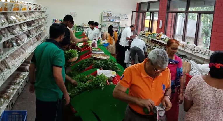Customers shopping for fresh greens at Jaivik Mall